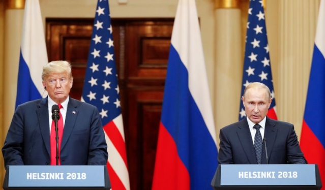 O presidente dos EUA, Donald Trump, e o presidente russo, Vladimir Putin, realizam uma coletiva de imprensa conjunta apÃƒÂ³s a reuniÃƒÂ£o (Foto: Grigory Dukor/Reuters)