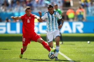  Di Maria marcou o gol que garantiu a vaga da Argentina (Foto: Getty Images/Clive Rose)