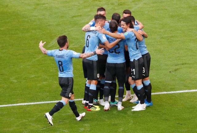 Jogadores do Uruguai comemoram gol sobre a RÃƒÆ’Ã‚Âºssia (Foto: David Gray/Reuters)