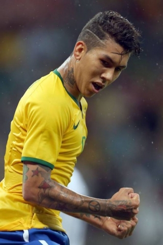 Firmino comemora gol pela seleÃ§Ã£o brasileira (Foto: JEFFERSON BERNARDES/AFP)